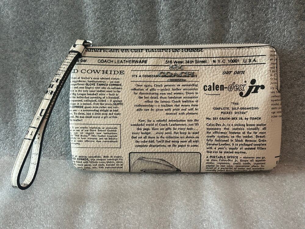 EUC Coach Large Corner Zip Wristlet Chalk Multi Newspaper Print Pebble Leather